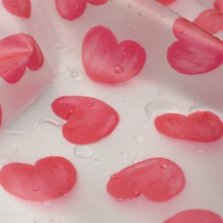 Tela de impermeable corazones textua