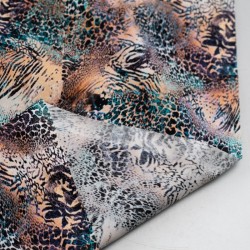 Tela de algodón estampado animal print revés