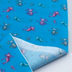 Tela de algodón con aqua dragons revés