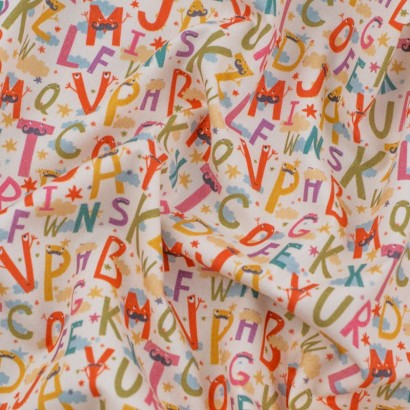 Tela de algodón con letras textura