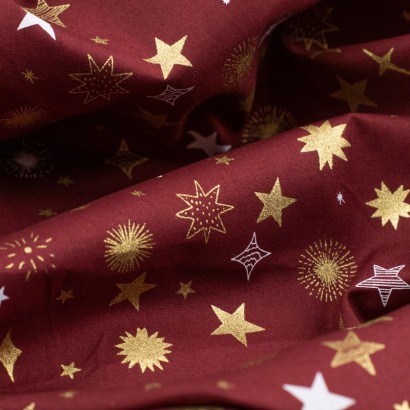 Tela de navidad estrellas y destellos detalle granate