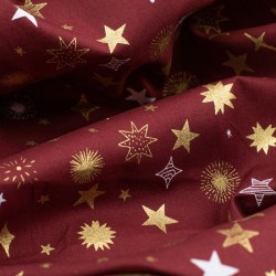 Tela de navidad estrellas y destellos detalle granate