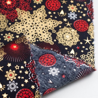 Tela de navidad copos y estrellas revés