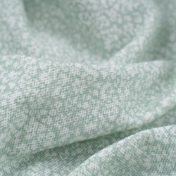 Tela de punto camiseta florcitas detalle