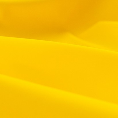 Tela de impermeable tonos lisos detalle amarillo limón