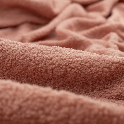 Tela de muleton rizado detalle rosa viejo pálido