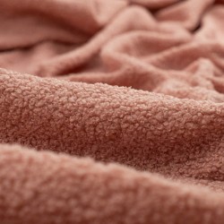 Tela de muleton rizado detalle rosa viejo pálido