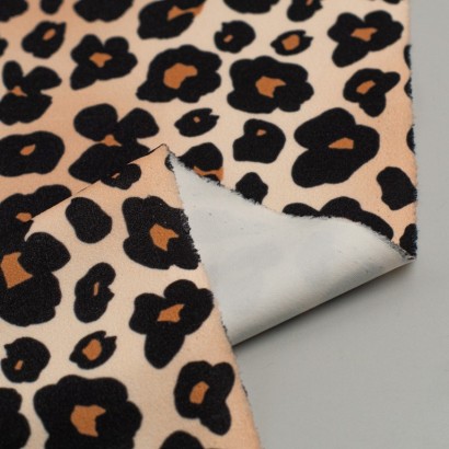 Tela de animal print Africa revés