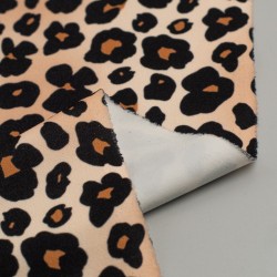 Tela de animal print Africa revés