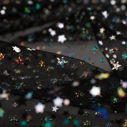 Tela de tul con estrellas detalle