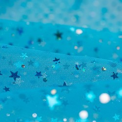 Tela de tul con estrellas colores detalle