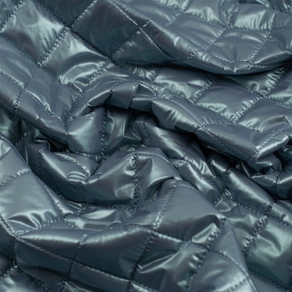 Tela de impermeable acolchado rombo textura azul