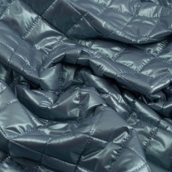 Tela de impermeable acolchado rombo textura azul