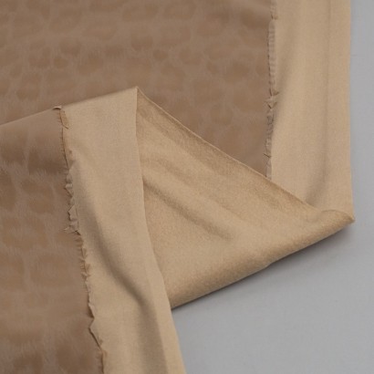 Impermeable estampado leopardo revés