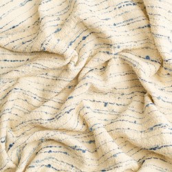Tela tipo tweed con blucles textura