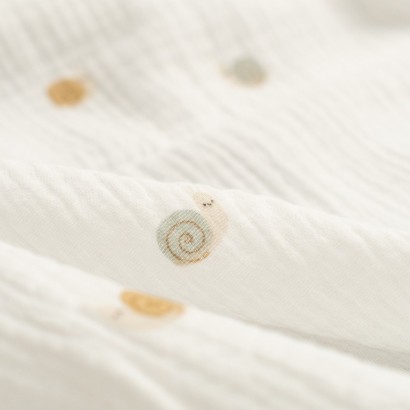 Tela de muselina caracoles detalle