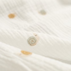 Tela de muselina caracoles detalle