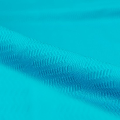 Tela de licra espiga detalle azul turquesa