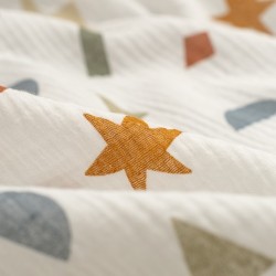 Tela de musalina estrellas y rayos detalle
