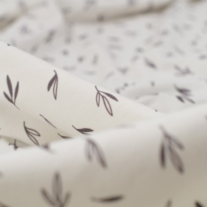 Tela de punto camiseta ramas detalle
