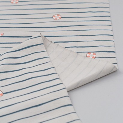 Tela de punto camiseta rayas y boyas revés