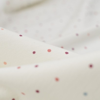 Tela de punto camiseta topos de colores detalle