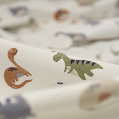Tela de punto camiseta dinosaurios detalle