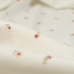 Tela de punto camiseta tulipanes detalle