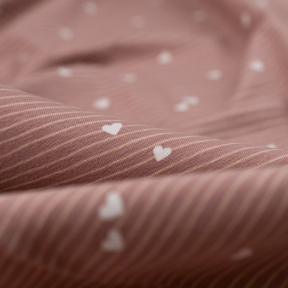 Tela de punto camiseta rayas y corazones detalle