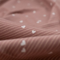 Tela de punto camiseta rayas y corazones detalle