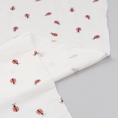 Tela de punto camiseta mariquitas revés