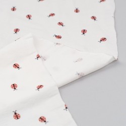 Tela de punto camiseta mariquitas revés