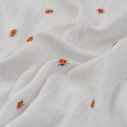Tela de muselinas mariquitas textura