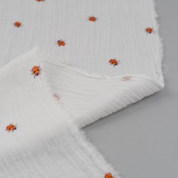 Tela de muselinas mariquitas revés