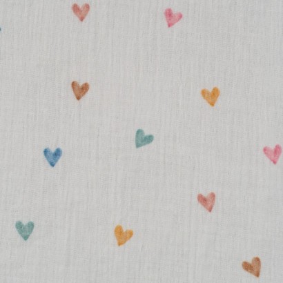 Tela de muselinas corazones de colores lisa