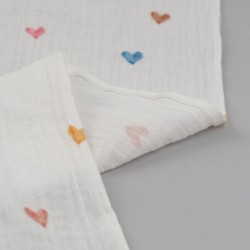 Tela de muselinas corazones de colores revés