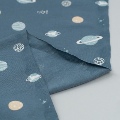 Tela de punto camiseta planetas revés