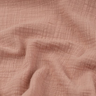Tela de muselina con trama textura rosa palo