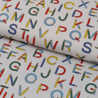 Tela de popelín letras de lápices lomo