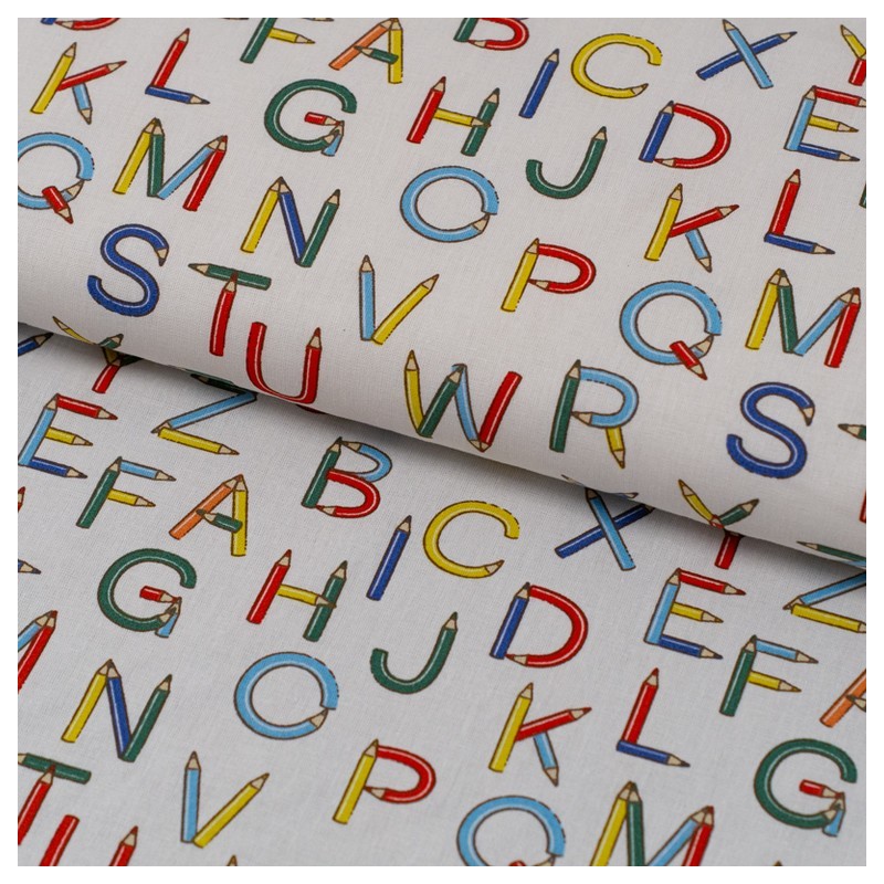 Tela de popelín letras de lápices lomo