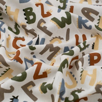 Tela de popelín letras de dinosaurios textura