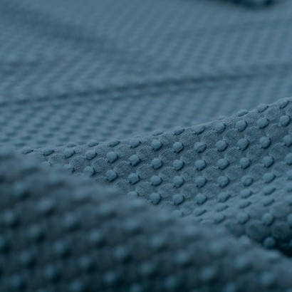 Tela de punto bodoques detalle azul turquesa