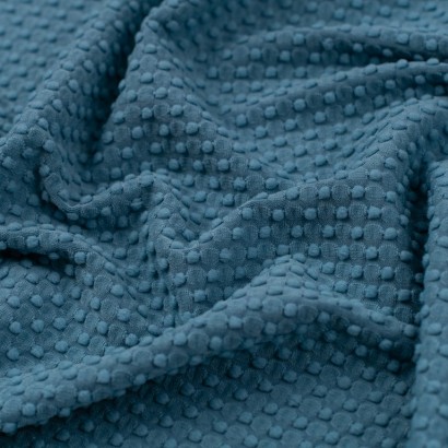 Tela de punto bodoques textura azul turquesa