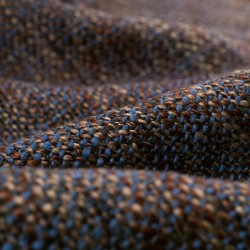 Tela de tweed jaspeada detalle azul