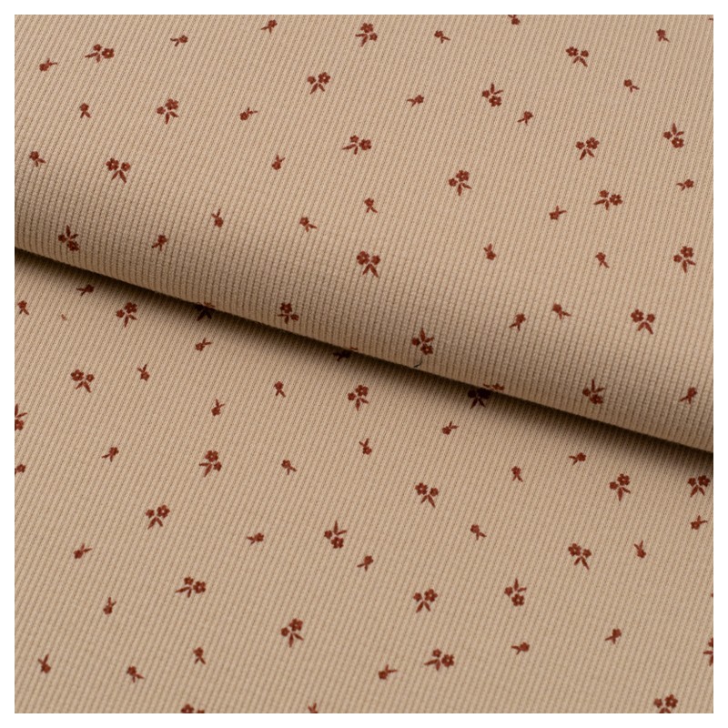 Tela de punto canalé florecillas lomo