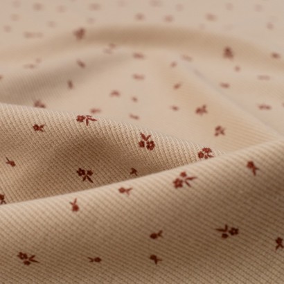 Tela de punto canalé florecillas detalle