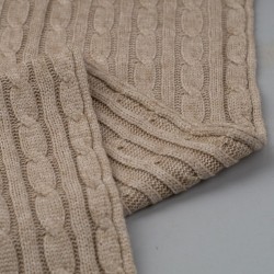 Tela de punto ochos trenzados revés beige