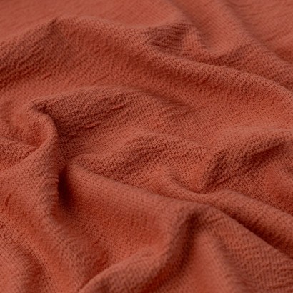 Tela de punto crepe textura rosa viejo