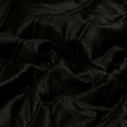 Tela de impermeable acolchado doble pespunte textura