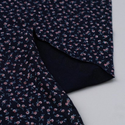 Tela de punto florecillas revés